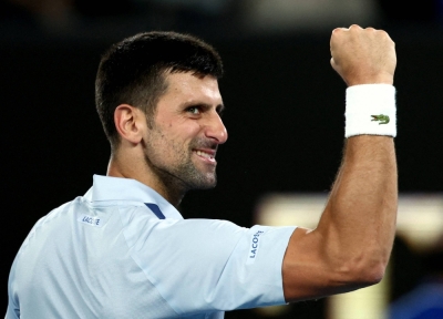 Serbia's Novak Djokovic celebrates after winning his fourth round match against France's Adrian Mannarino on Sunday in Melbourne. 