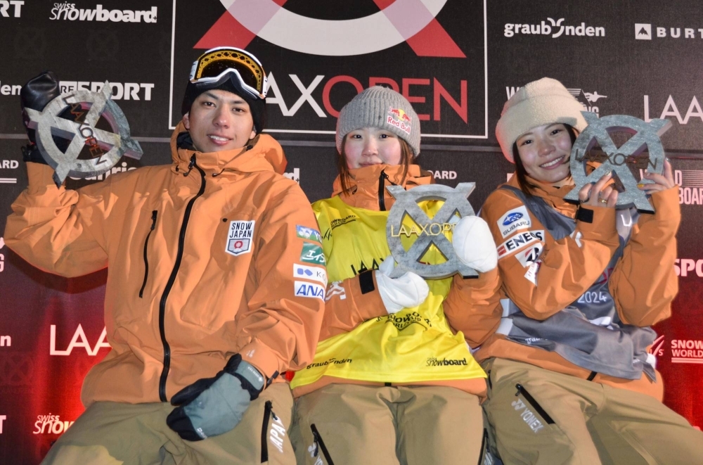 From left: Japan's Ruka Hirano, Mitsuki Ono and Ruki Tomita pose for a photo after they each landed on the podium at the World Cup event in Laax, Switzerland, on Saturday. 