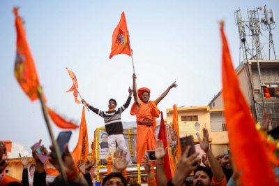 Hindu devotees gather in a procession on the eve of the opening of the Ram temple in Ayodhya, India, on Sunday.