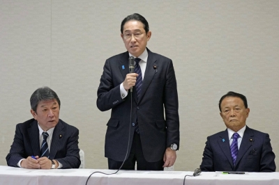 Liberal Democratic Party Secretary-General Toshimitsu Motegi (left), Prime Minister Fumio Kishida and LDP Vice President Taro Aso at a political reform meeting at the party headquarters in Tokyo on Monday