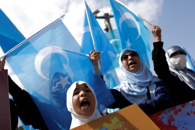 Ethnic Uyghurs protest against China in Istanbul on July 5.