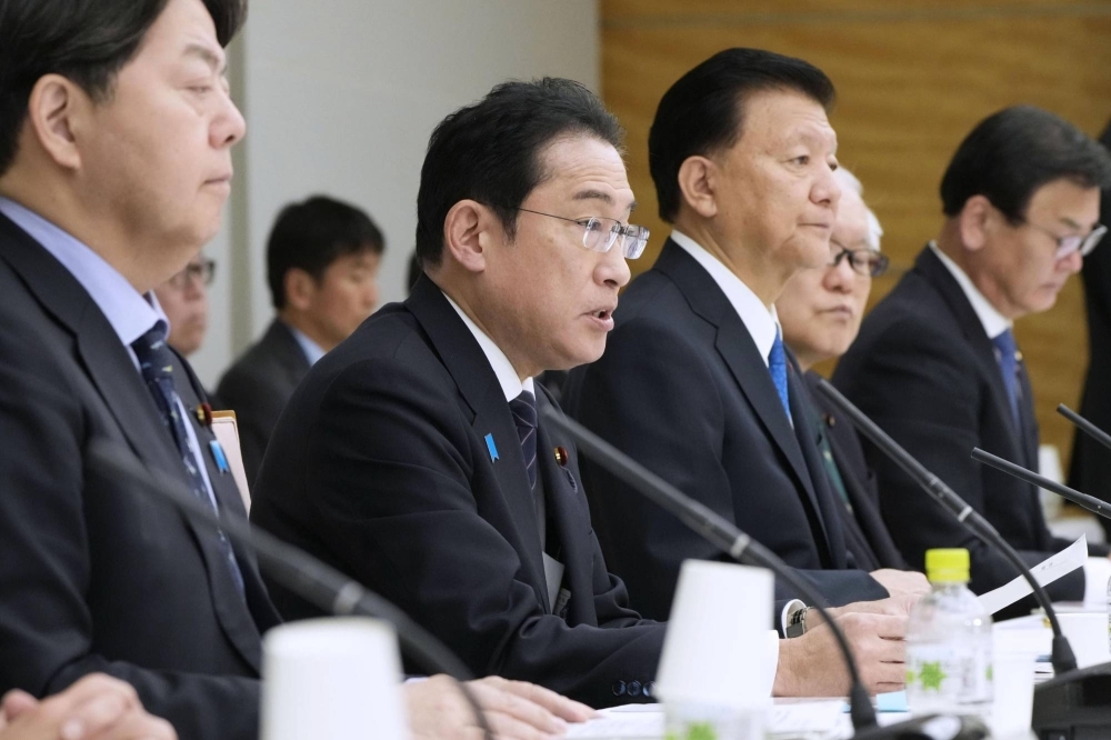With meetings, Japan leader amplifies call for wage hikes at small ...