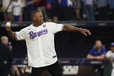 Former Rangers star Adrian Beltre throws out the ceremonial first pitch before a World Series game at Globe Life Field in Arlington, Texas, on Oct. 28.
