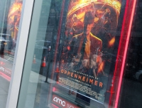 An Oppenheimer film poster at AMC Lincoln Square Theater in New York in July | Getty Images / via Bloomberg