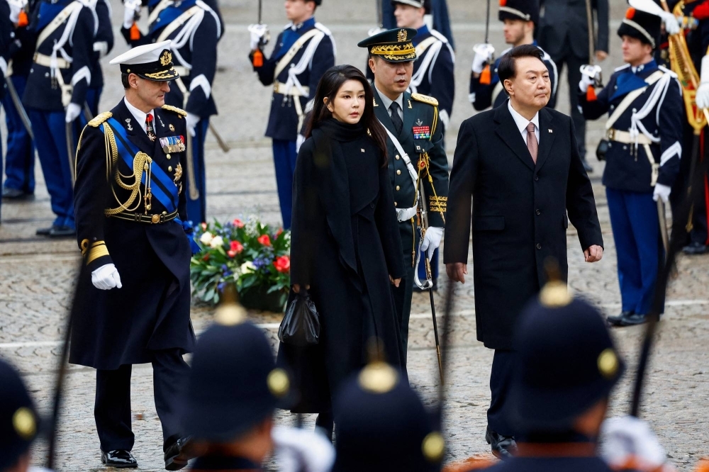 South Korea's President Yoon Suk-yeol and his wife Kim Keon-hee have been plunged into controversy after hidden camera footage emerged appearing to show Kim accepting a Dior bag as a gift.