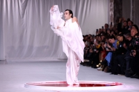 Dancer Pau Aran Gimeno presents a creation by designer Yuima Nakazato in Paris. | REUTERS