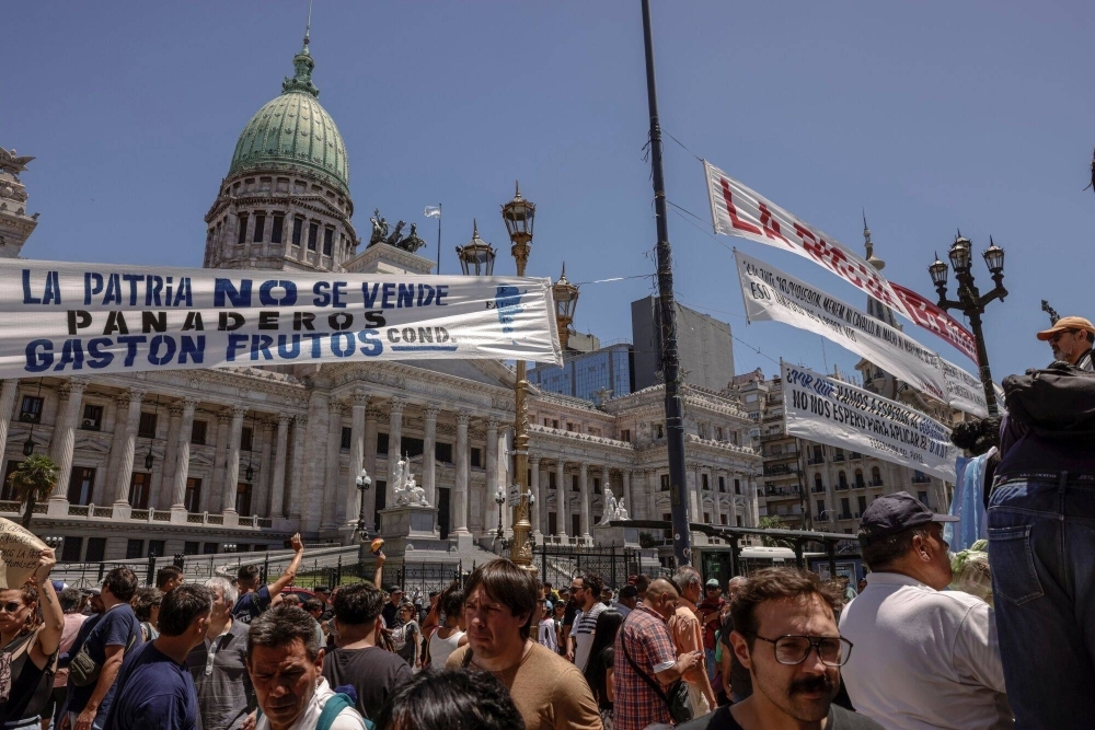 Protesters during a nationwide strike near the National Congress in Buenos Aires on Wednesday. Argentina's labor movement is staging a general strike that will test popular support for President Javier Milei's austerity blitz less than two months into his presidency. 