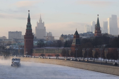 Ice covers the Moskva river in downtown Moscow. The Kremlin still mostly relies on volunteers to fight its war in Ukraine, offering 210,000 rubles monthly.
