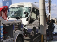 A minibus that crashed into a telephone pole in Kasuya, Fukuoka Prefecture, on Thursday | Kyodo