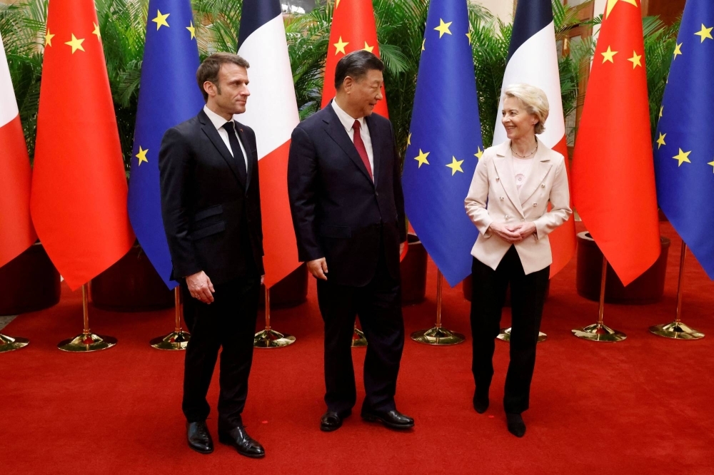 Chinese President Xi Jinping, his French counterpart, Emmanuel Macron, and European Commission President Ursula von der Leyen meet in Beijing in April last year.