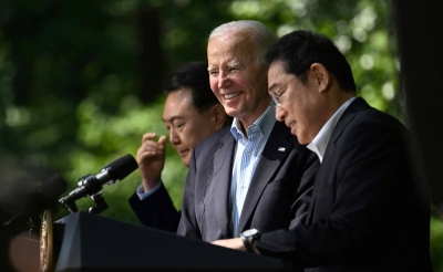 South Korean President Yoon Suk-yeol, U.S. President Joe Biden and Prime Minister Fumio Kishida at a news conference at Camp David in Maryland in August