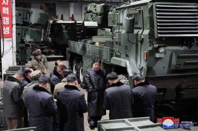 North Korean leader Kim Jong Un visits a munitions factory at an undisclosed location in this picture released on Jan. 10.