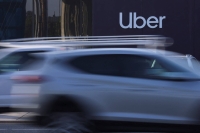 Uber Japan has started discussions with partner taxi companies aiming to introduce ride-sharing services. | Reuters
