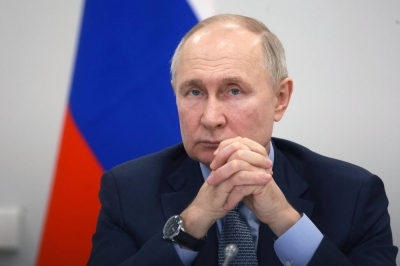 Russian President Vladimir Putin chairs a meeting in Saint Petersburg, Russia, on Friday. 