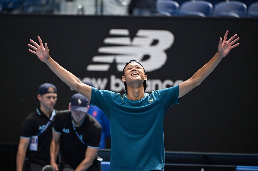 Japan's Rei Sakamoto celebrates after winning the junior boys' singles final at the Australian Open in Melbourne on Saturday.