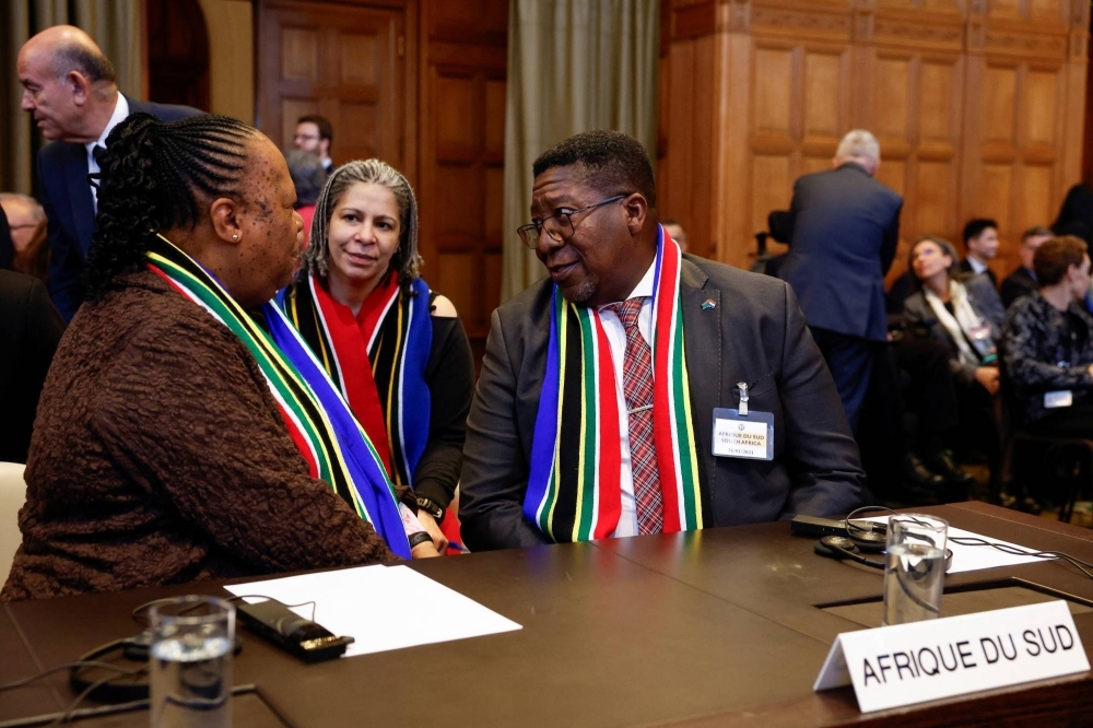 South African officials speak ahead of the International Court of Justice's ruling on emergency measures against Israel following accusations by South Africa that the Israeli military operation in Gaza is a state-led genocide, in The Hague on Friday. 