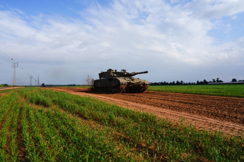 An Israeli tank near the Israel-Gaza border on Saturday