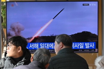 A news broadcast shows a North Korean missile test at the main railway station in Seoul on Wednesday.
