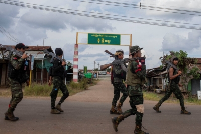 Volunteer members of Karenni insurgent forces walk in Moe Bye in Kayah State, Myanmar, on Nov. 12, 2023. 