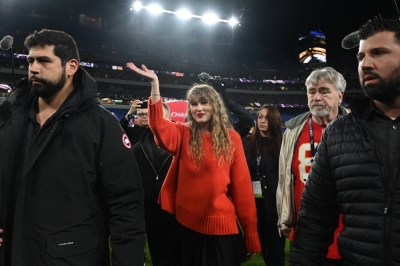 Singer Taylor Swift walks off the field after the AFC title game in Baltimore, Maryland, on Sunday.