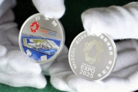 Silver coins worth ¥1,000 minted to commemorate the 2025 World Exposition in Osaka, at the Japan Mint in the city of Osaka in August 2023 | Kyodo
