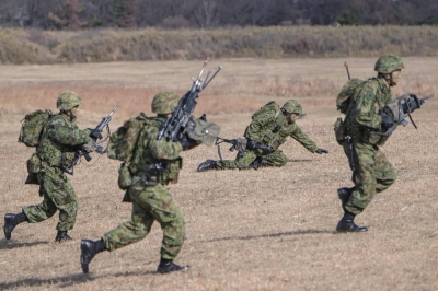 Japanese troops take part in a joint military drill and demonstration conducted by the Ground Self-Defence Force with participants from the U.S., Britain, Canada, Germany and others at Camp Narashino in the city of Funabashi, Chiba Prefecture, on Jan. 7.