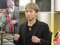Undisputed world super bantamweight boxing champion Naoya Inoue poses for a photo after taking part in a WOWOW TV program in Tokyo on Monday. | Kyodo