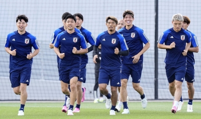 Japan players train in Doha on Tuesday ahead of a last-16 knockout match against Bahrain in the Asian Cup tournament on Wednesday.