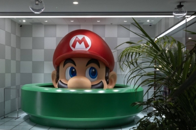 A statue of Mario on display inside a Takashiyama department store in Kyoto in November. Nintendo's shares have soared 47% in the past year, outpacing gains in console rivals Microsoft and Sony Group over the past couple of months.