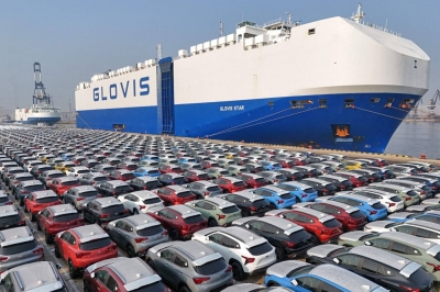 Cars ready to be loaded onto a ship for export at the port in Yantai, in China's eastern Shandong province, on Jan. 2