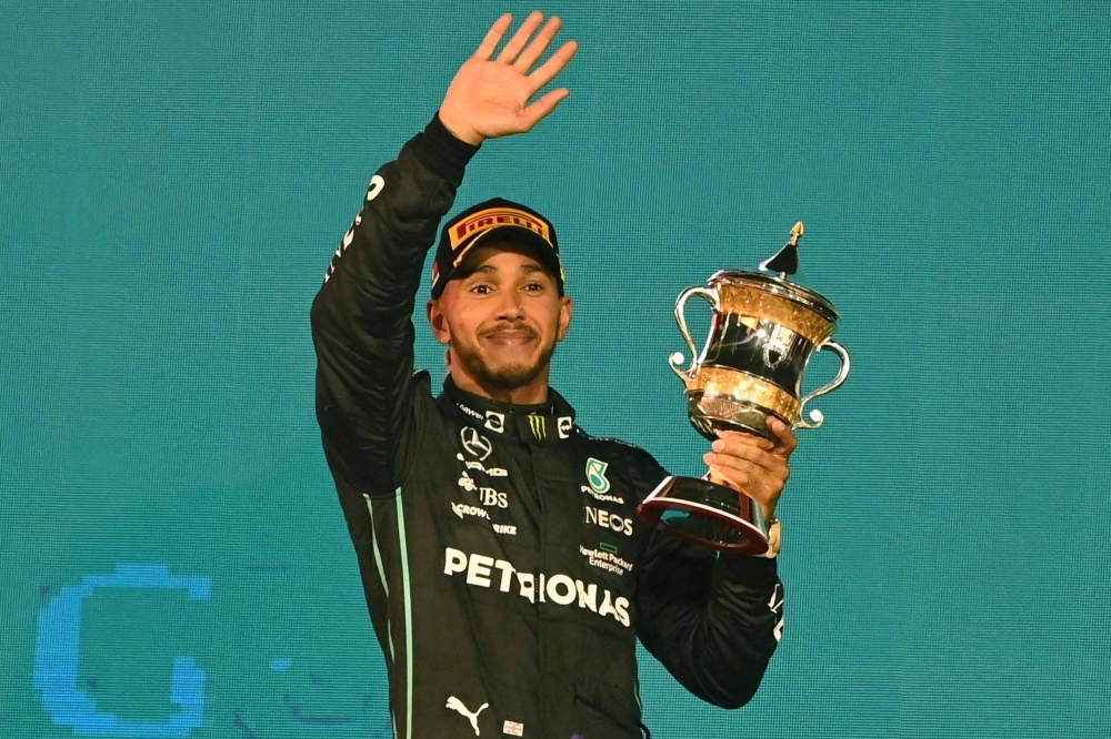 Mercedes' Lewis Hamilton, seen after a third-place finish at the Bahrain Grand Prix in March 2022, will make a blockbuster move to Ferrari after the 2024 season. 