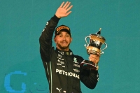 Mercedes' Lewis Hamilton, seen after a third-place finish at the Bahrain Grand Prix in March 2022, will make a blockbuster move to Ferrari after the 2024 season.  | AFP-JIJI