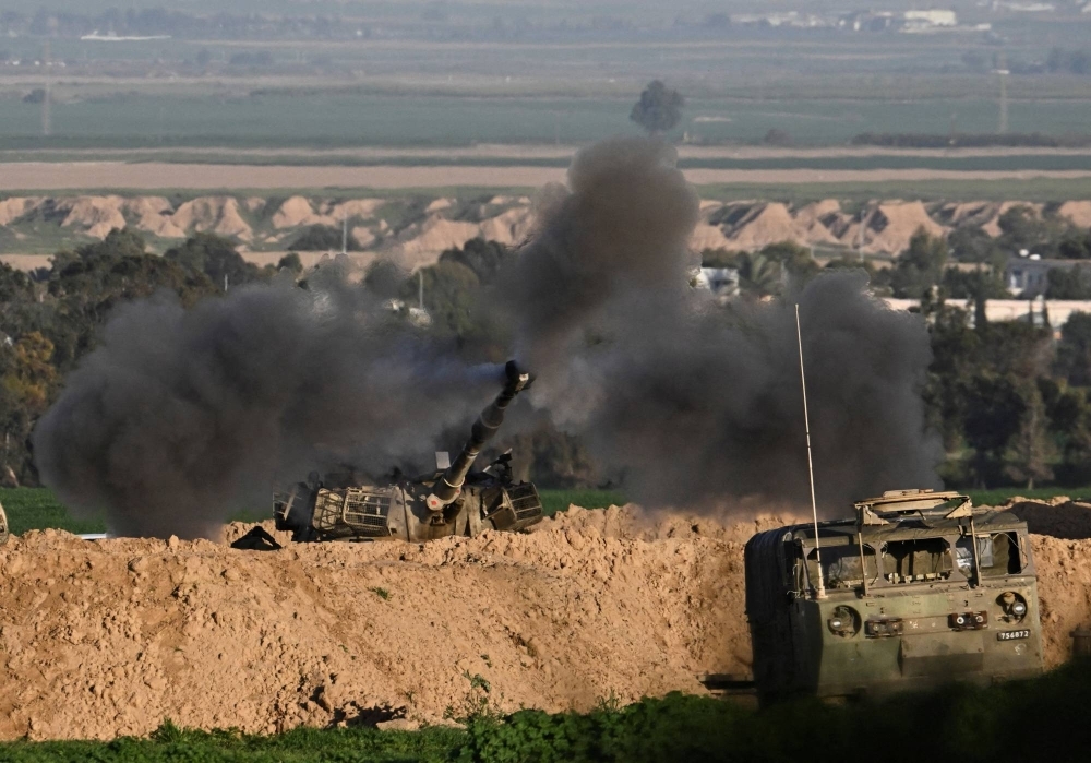 An Israeli mobile artillery unit fires toward Gaza on Thursday. Israeli Prime Minister Benjamin Netanyahu and his war Cabinet have been under increasing pressure to bring home the hostages taken by Hamas on Oct. 7.