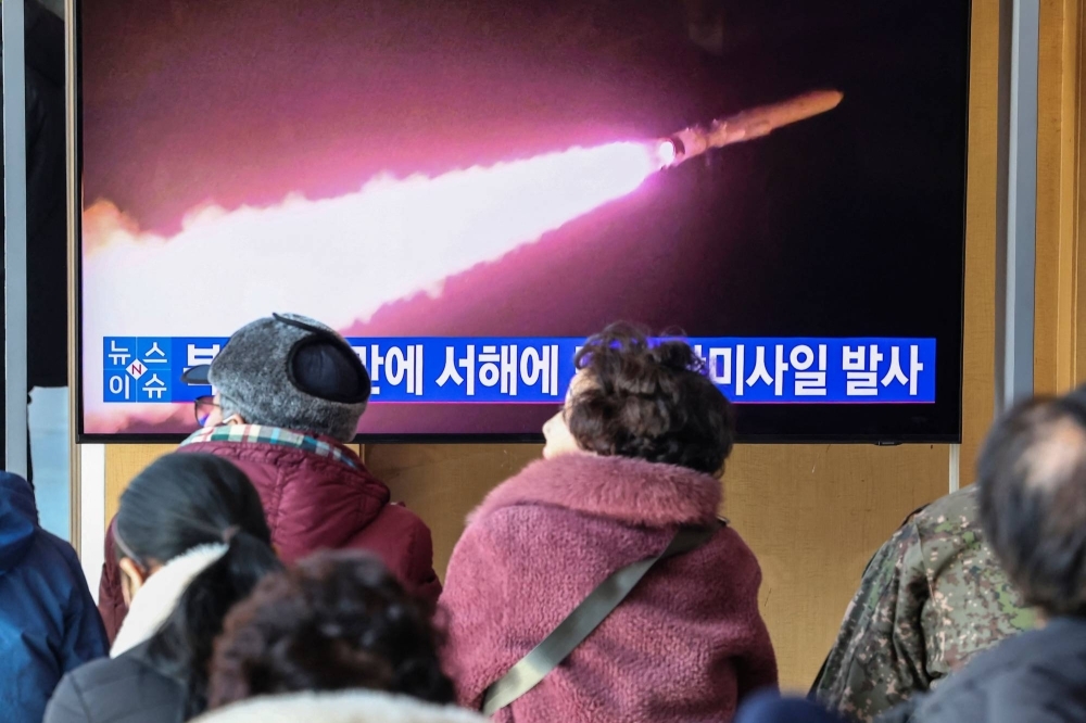 A news broadcast showing at a railway station in Seoul on Tuesday shows footage of a previous North Korean missile launch.
