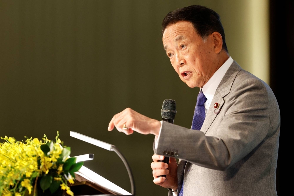 Former Prime Minister Taro Aso speaks during a forum in Taipei in August. 