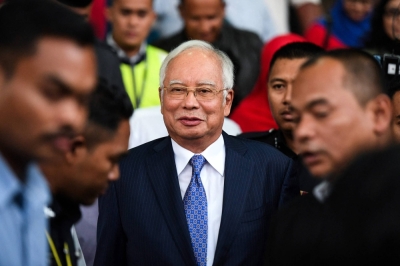 Former Malaysian Prime Minister Najib Razak leaves a court in Kuala Lumpur on April 3, 2019. 