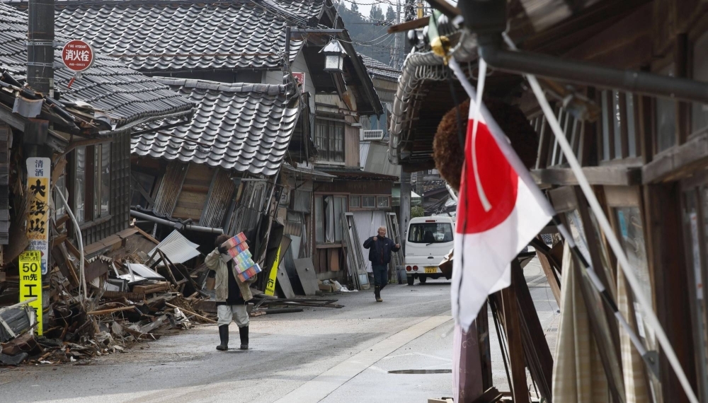 Collapsed homes in the town of Noto, Ishikawa Prefecture, on Jan. 12. Ever since breaking off from the Eurasian continent 20 million years ago and opening the Sea of Japan, the archipelago has always been at the mercy of nature’s seismic whims, its landscape and ecology undergoing perpetual transfiguration.