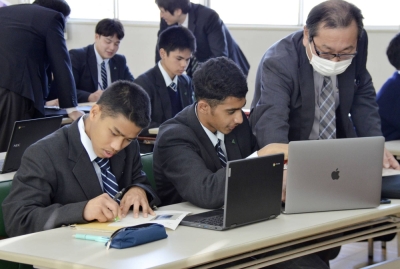 Students take a Japanese-language lesson at Ishigeshiho High School in Ibaraki Prefecture in January.