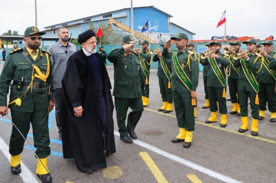 Iranian President Ebrahim Raisi (third from left) visits a navy base in Bandar Abbas, southern Iran. U.S. President Joe Biden is being urged to attack Iran directly, but that may not be the right solution.