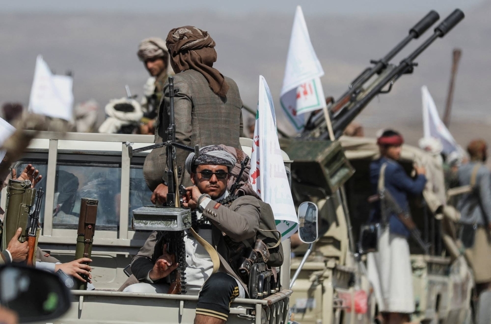 Houthi tribesmen gather to show defiance after U.S. and U.K. airstrikes on Houthi positions near Sanaa, Yemen, on Sunday.