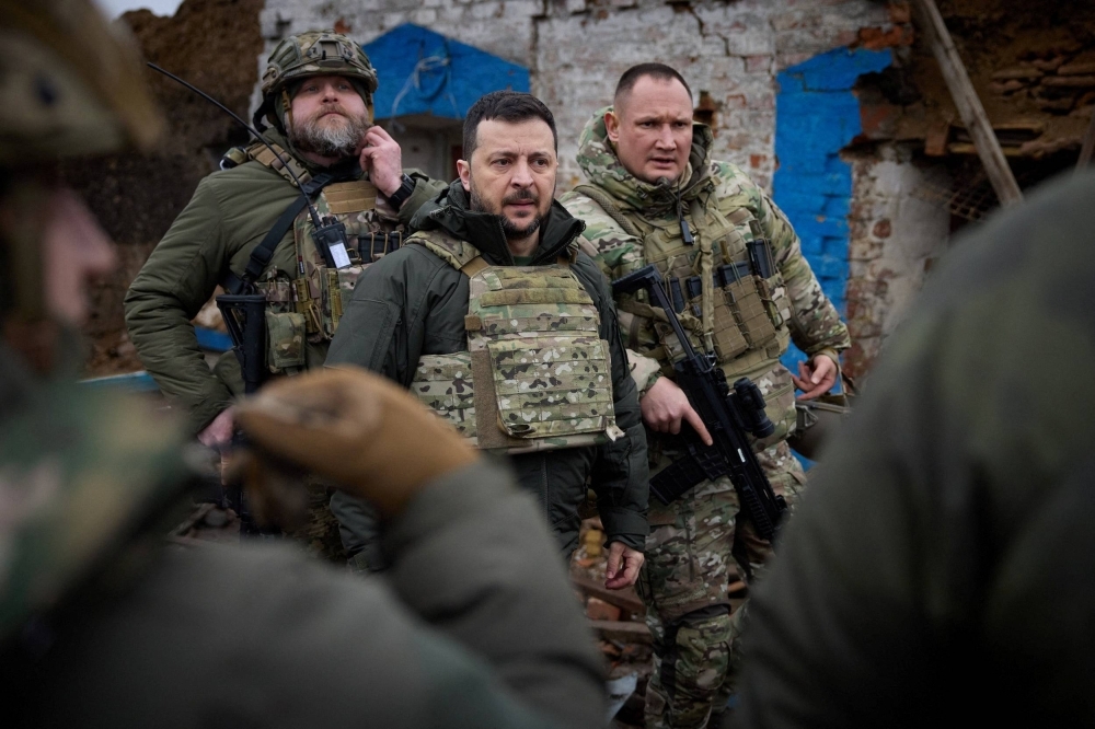 Ukrainian President Volodymyr Zelenskyy visits a frontline in the Zaporizhzhia region, Ukraine, on Sunday.