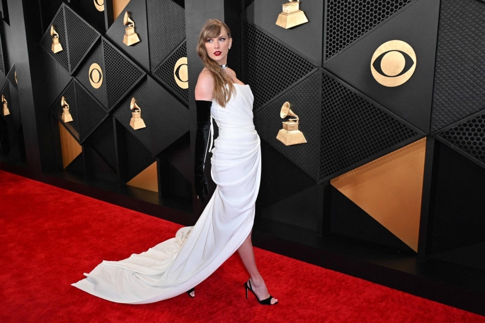 Singer-songwriter Taylor Swift arrives for the 66th Annual Grammy Awards at the Crypto.com Arena in Los Angeles on Sunday.