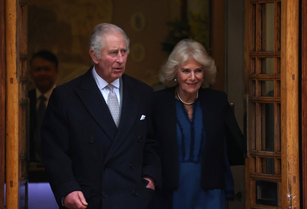 Britain's King Charles leaves the London Clinic with Britain's Queen Camilla after receiving treatment for an enlarged prostate, in London on Jan. 29.