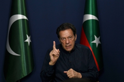 Pakistan's former Prime Minister Imran Khan during an interview at his residence in Lahore on May 18, 2023. His name may not be on the ballot, but Khan will be on the country's mind as Pakistan votes in an election on Feb. 8 that observers say is deeply flawed without his participation. The former international cricket star has been given three lengthy prison sentences in under a week and banned from politics for 10 years — officially excluding him from an election it never looked like he would allowed to contest.