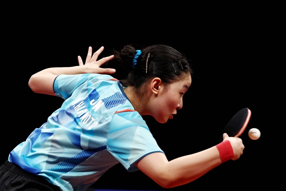 Miwa Harimoto in action during her women's doubles semifinal match with Miyuu Kihara against South Korea's Jeon Jihee and Shin Yubin in Hangzhou, China, on Oct. 2.