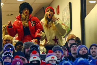 Taylor Swift (right) cheers on her boyfriend Travis Kelce's team, the Kansas City Chiefs, in the AFC divisional round playoff game against the Buffalo Bills in Orchard Park, New York, on Jan. 21. The Chiefs will play the San Francisco 49ers in the Super Bowl.