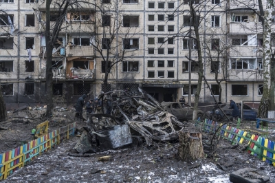 Cars and homes destroyed by a Russian missile that fell between a residential building and a public preschool in Kyiv on Dec. 13, 2023. In January, the White House said it had evidence that North Korea had provided ballistic missiles used by Russia. 
