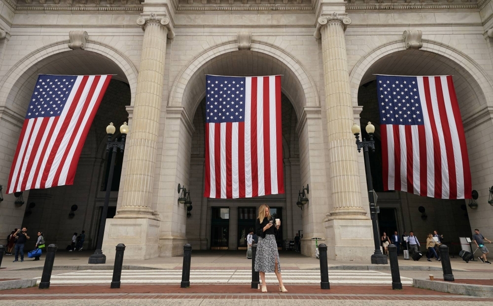 Flags fly at Union Station in Washington on June 27. With the U.S. presidential election approaching, caution is being urged over the widespread proliferation of propaganda.