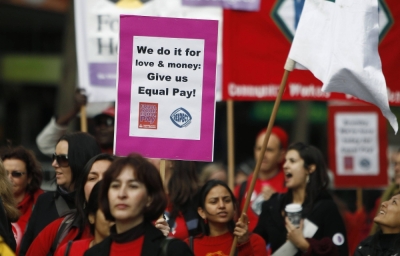 Women workers demand equal pay during a protest in Melbourne.