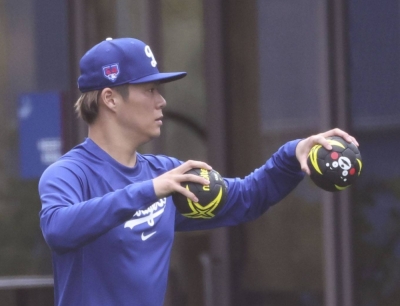 Yoshinobu Yamamoto works out at the Dodgers' spring training facility in Glendale, Arizona, on Tuesday. 